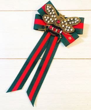 fake gucci brooch|Gucci ribbon brooch for sale.